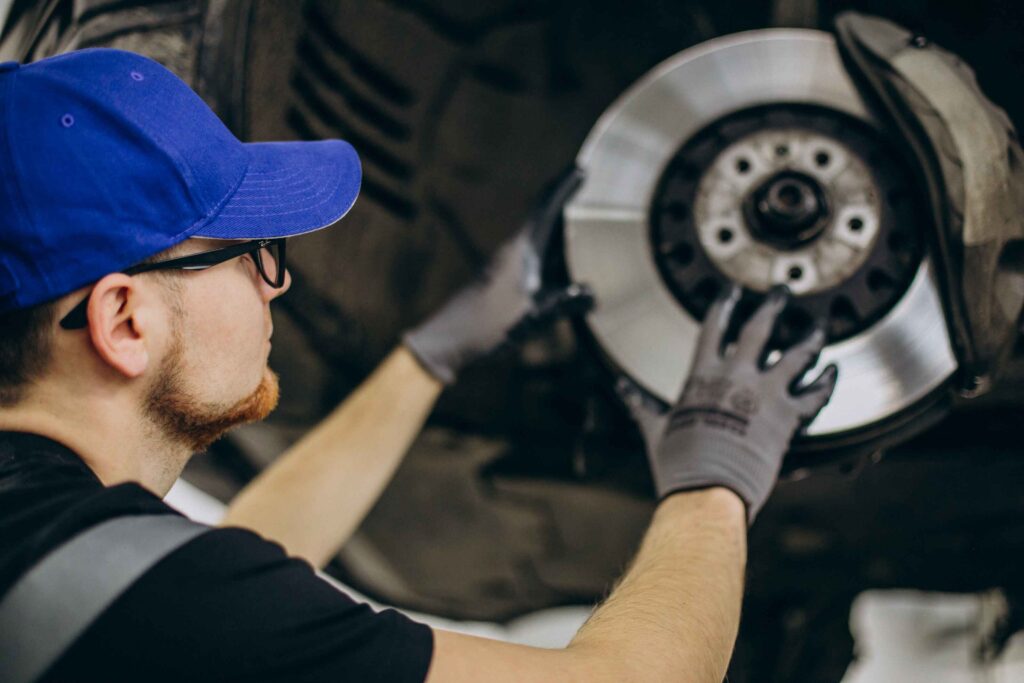 mechanic-changing-brake-discs-car-service (1)